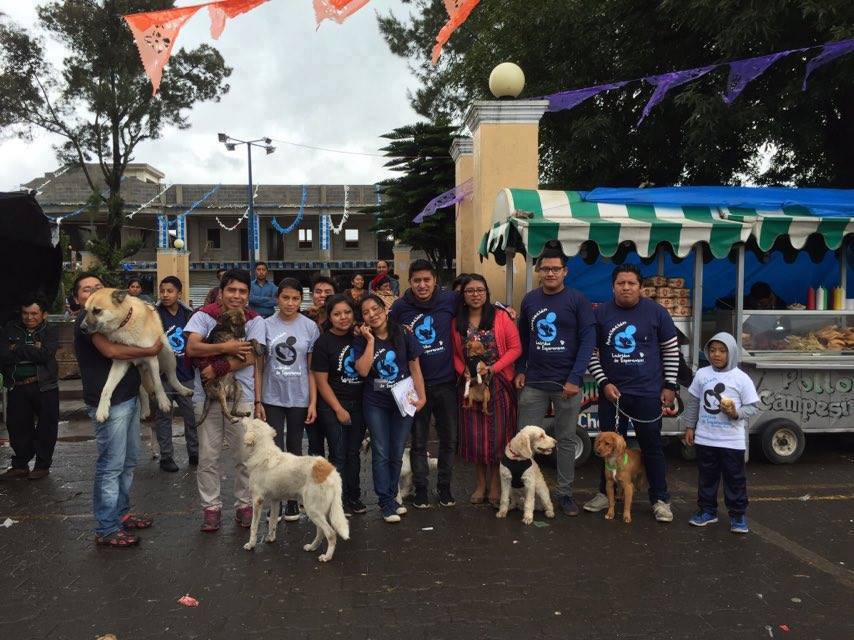 A group of Ladridos de Esperanza volunteers meeting before a children’s event they held.