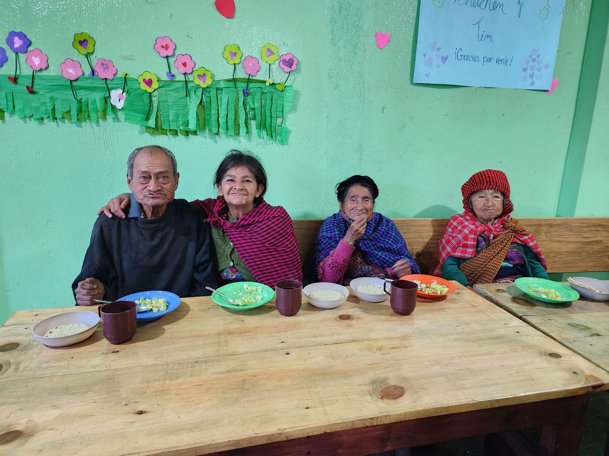 Elderly enjoying lunch together.
