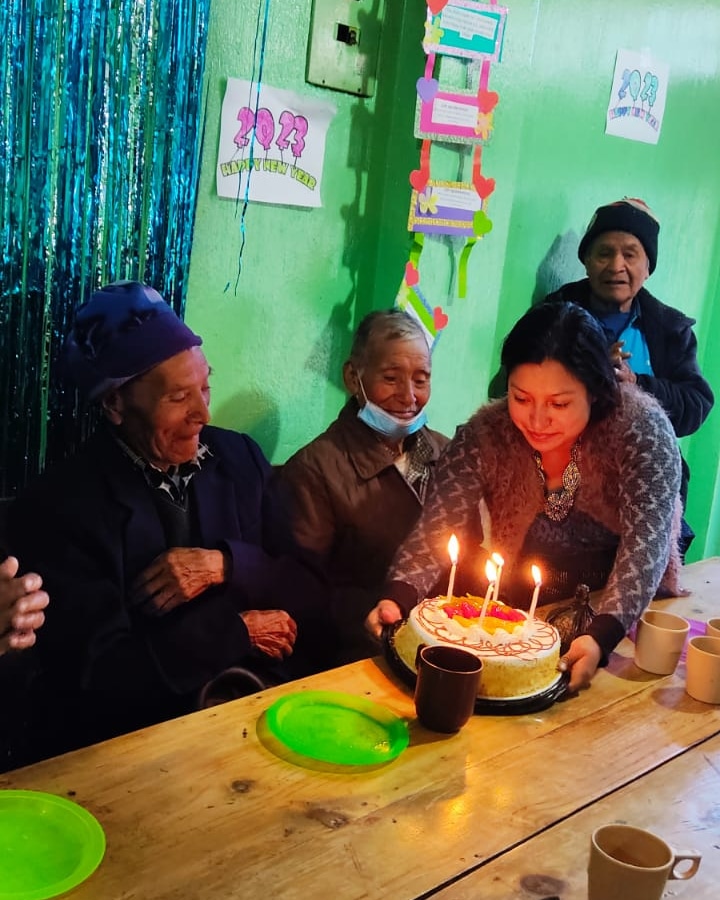 Celebrating a birthday with cake and candles.