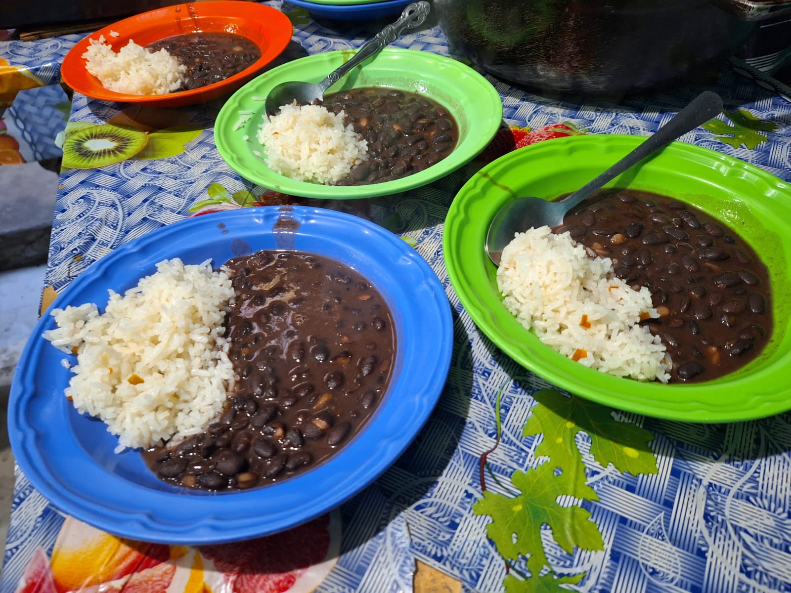 Beans and rice on a table.