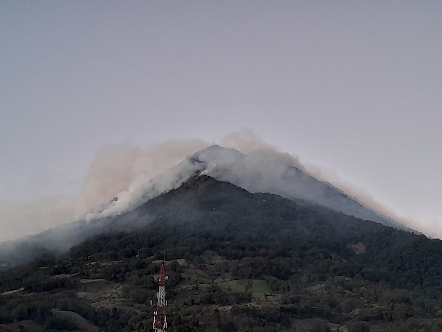 Volcano Fuego covered in smoke.